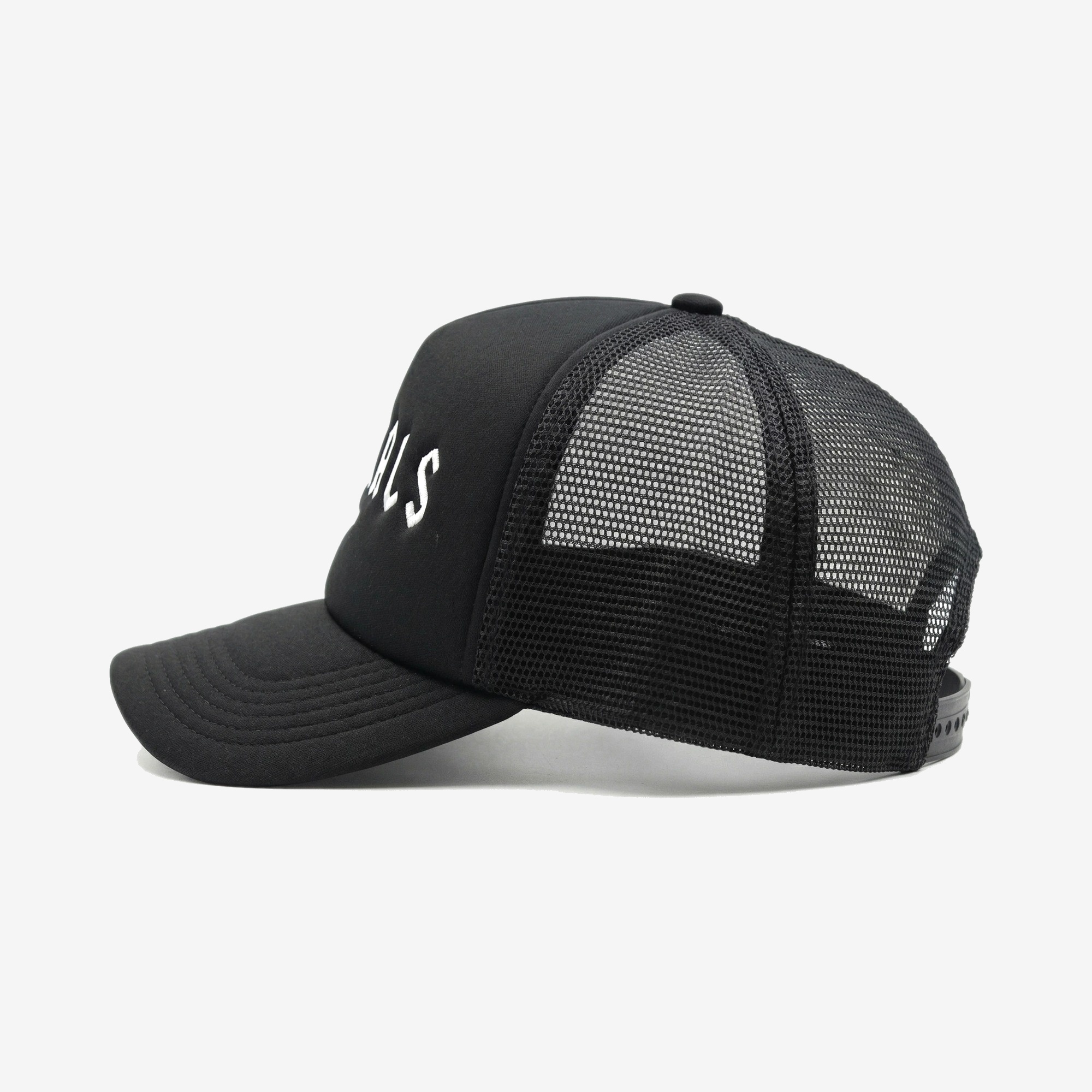 Blanc Trucker Cap in Black — worn by a model