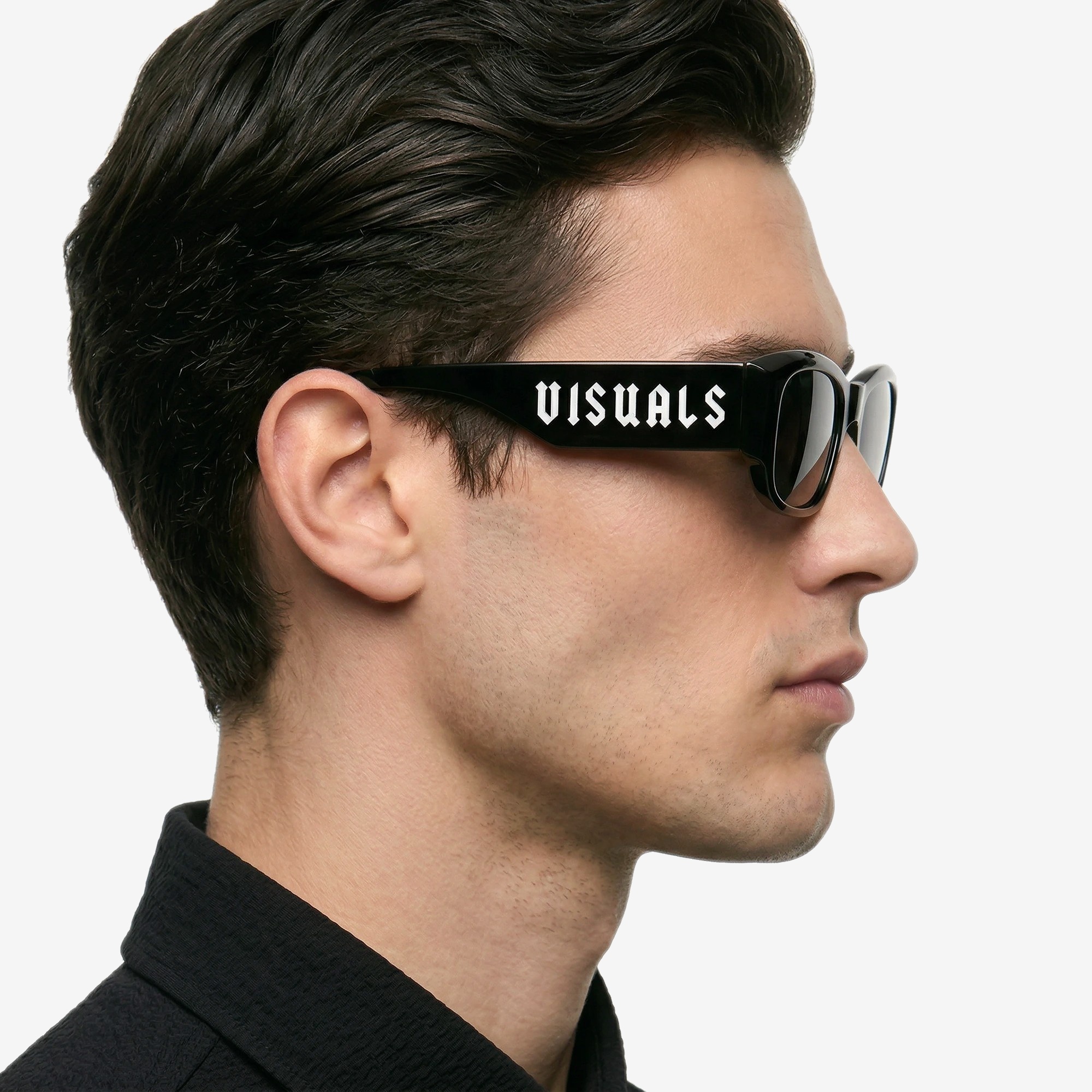 Couture Gothique Sunglasses in Noir Black — worn by a model