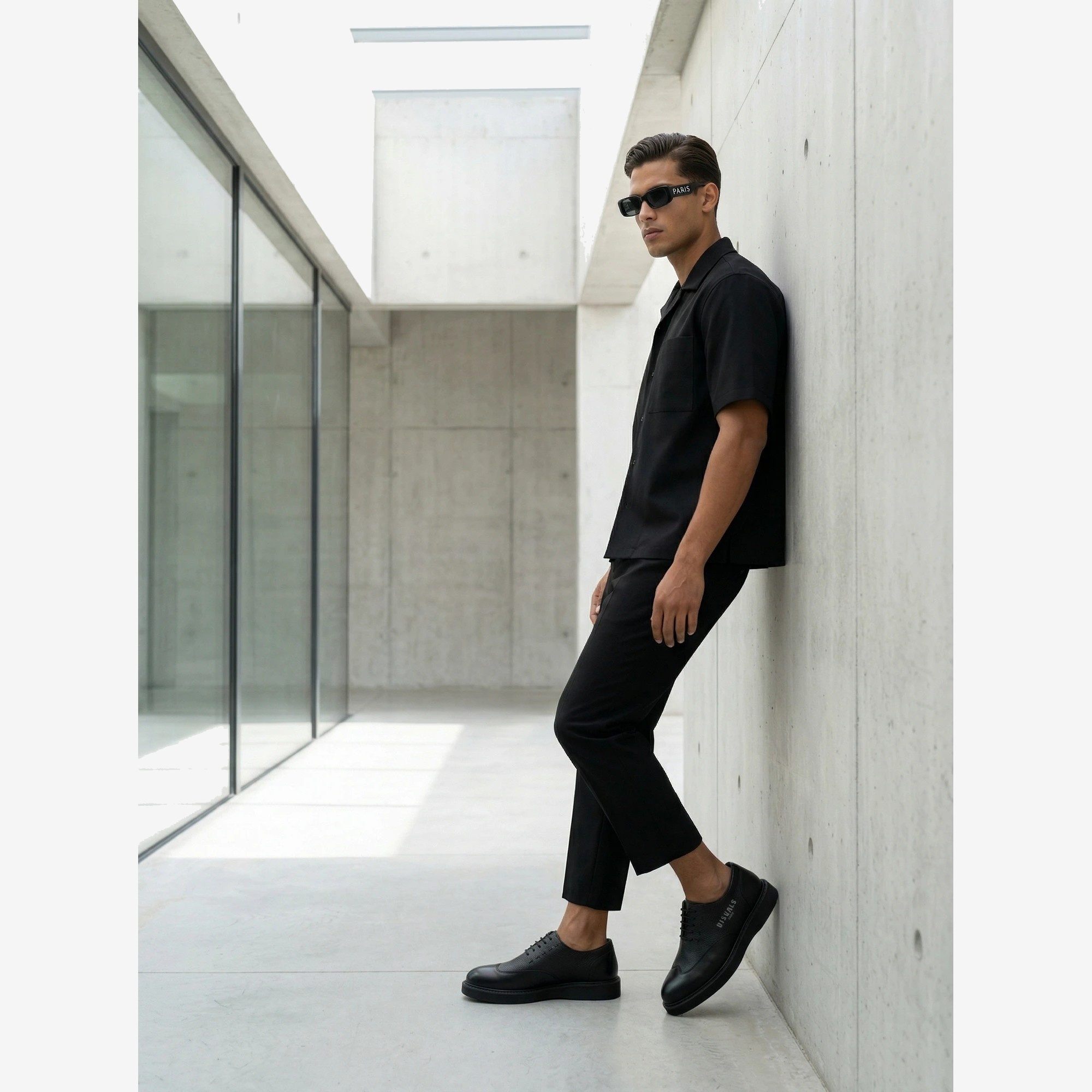 Classic Derby in Noir Pebbled — worn by a model