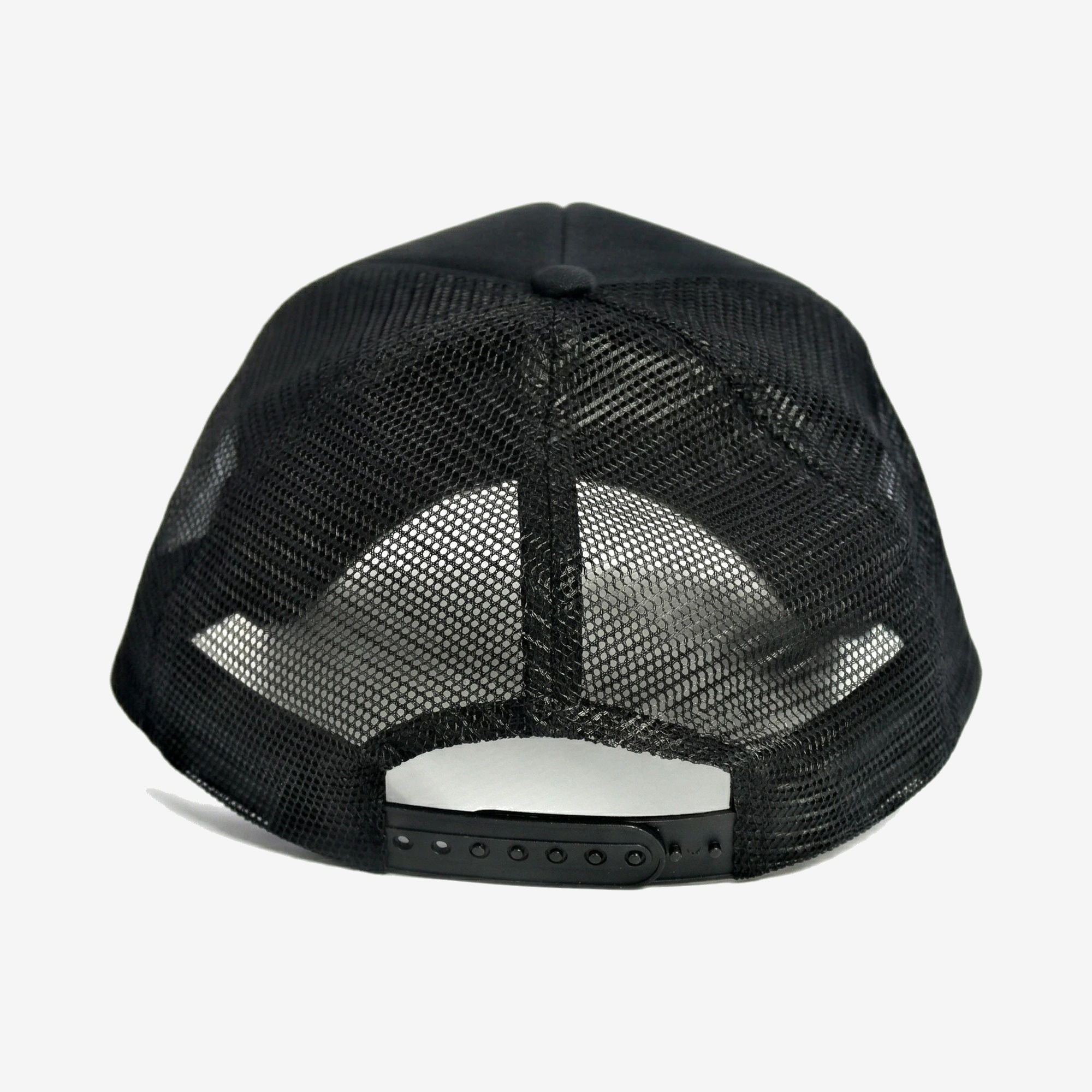Blanc Trucker Cap in Black — worn by a model