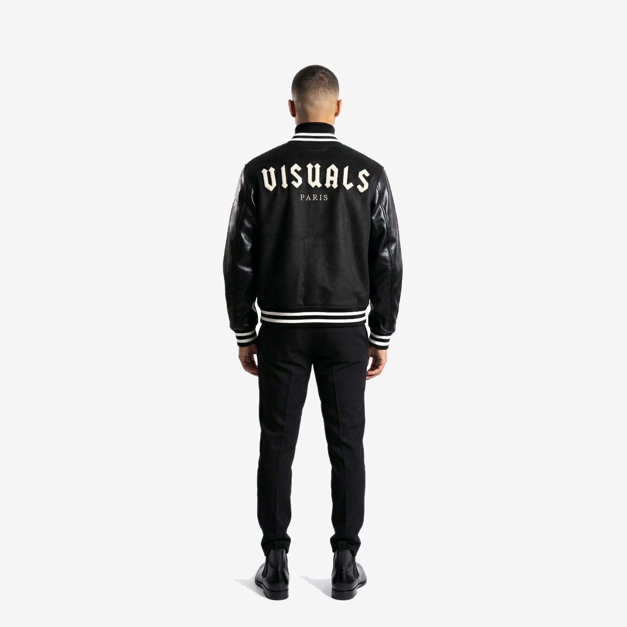 Tour Eiffel Varsity Jacket in Black / Ivory — worn by a model