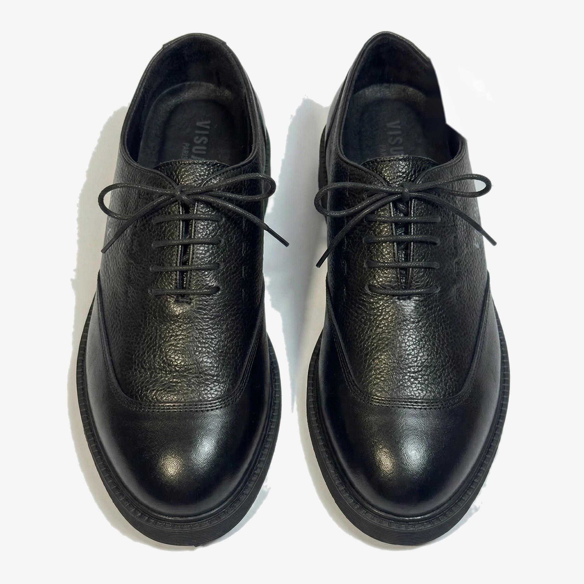 Classic Derby in Noir Pebbled — studio view